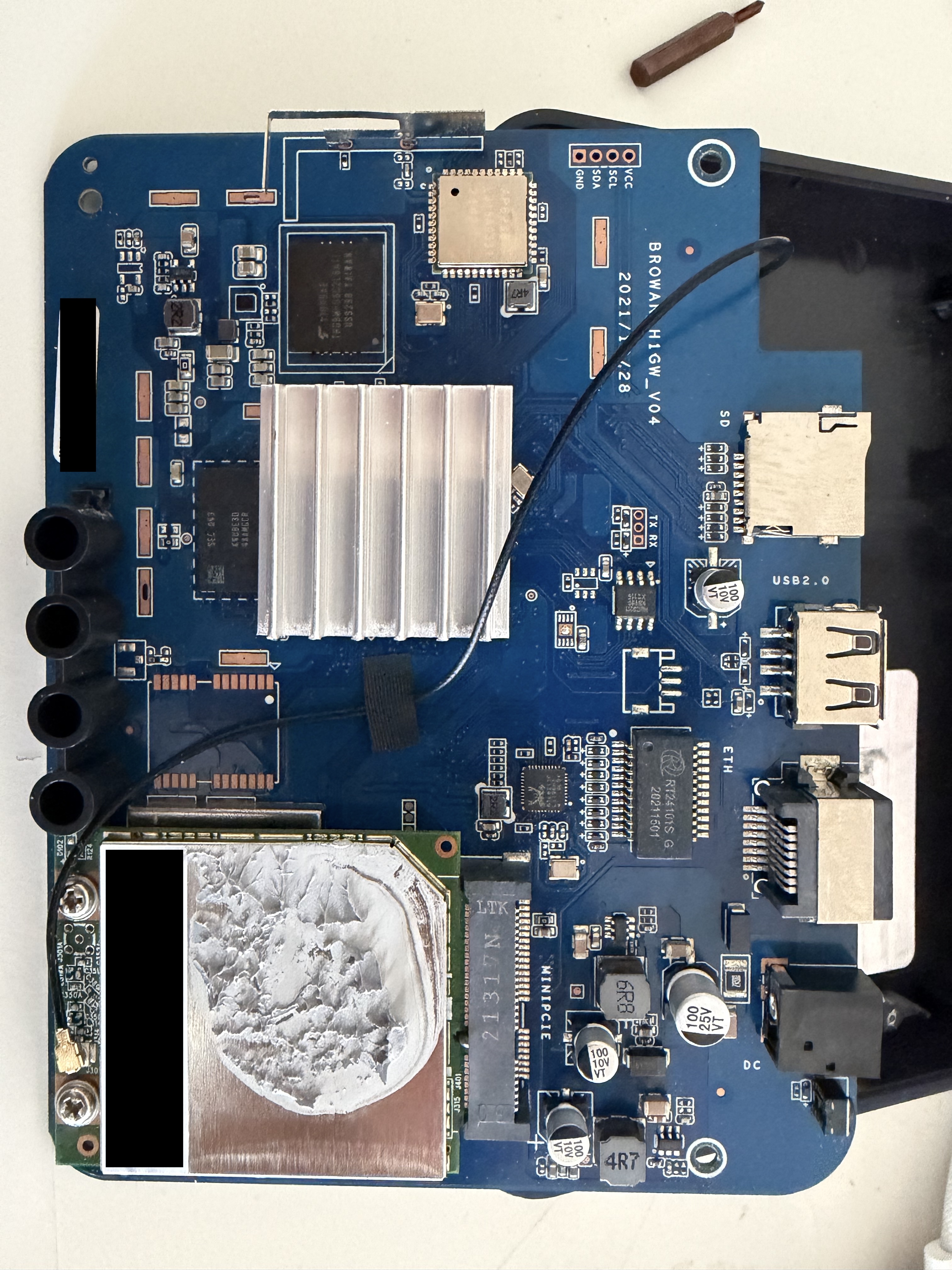 PCB top side showing BROWAN H1GW V04 board with RK3566 under heatsink, SD slot, USB ports, Ethernet, and mini PCIe LoRa module